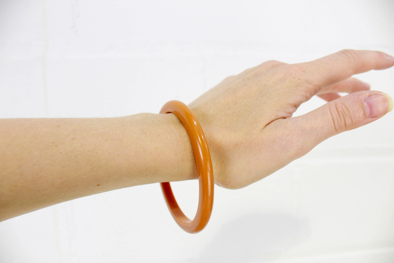 1940s Orange Bakelite Spacer Bangle Bracelet