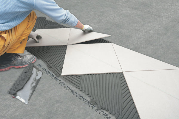 Tile Installers in Palm Beach placing tiles