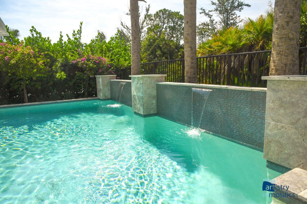 beautiful outside pool made with quality tile in palm beach