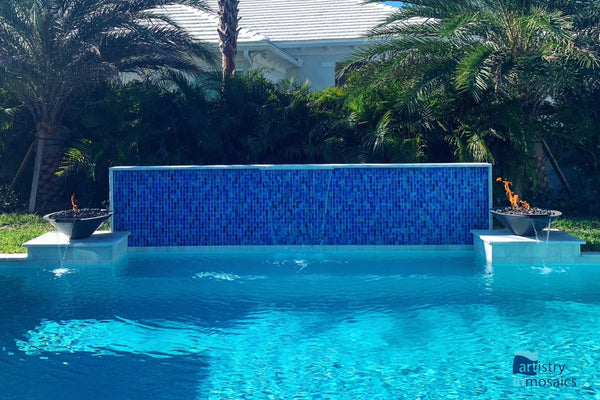 modern outside pool with blue tile in Palm Beach