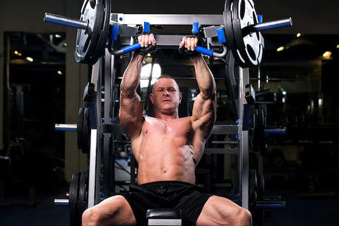 chest workout of muscular man