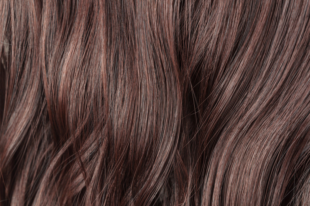 Does Biotin Make Your Hair Grow Longer Dermatologists Weigh In  Allure