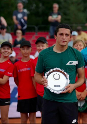 Harold Mayot holding trophy for being the Runner-Up at the ATP Challenger in Tampere 