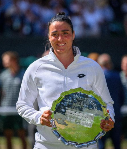 Ons Jabeur holding trophy for runner-up in the Ladies’ Singles at Wimbledon