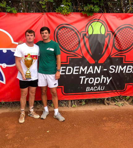 Oliver Crawford holding trophy after winning at the ITF M25 in Bacau