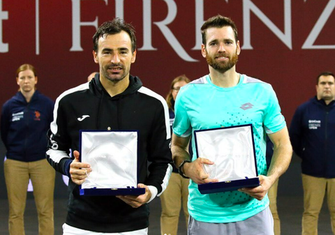 Austin Krajicek and Ivan Dodig holding trophies for making it to the finals at the 250 ATP Tournament in France. 