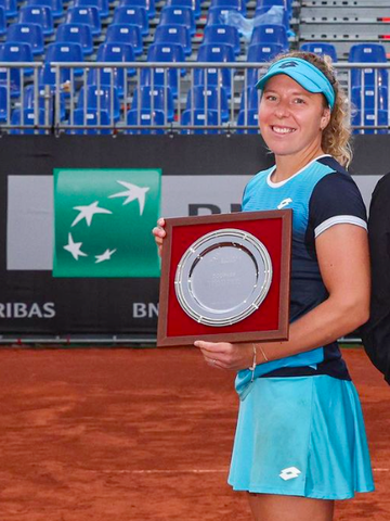 Anna-Lena Friedsam holding trophy after winning the womens Doubles at the WTA 250 in Warsaw