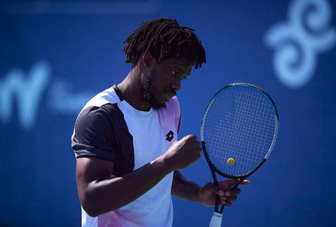  Alafia Ayeni holding tennis racket during the semifinals at the ATP Challenger