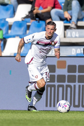 Pasquale Mazzocchi kicking a soccer ball. 