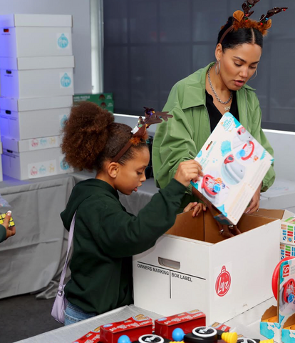 Ayesha Curry packing boxes