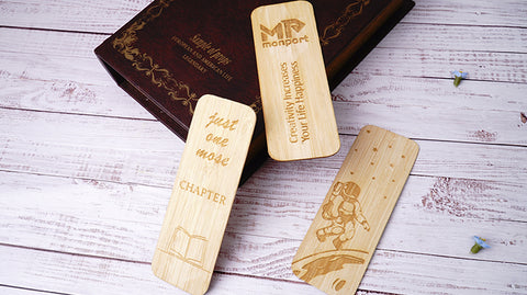 Laser engraving bookmark with students in school