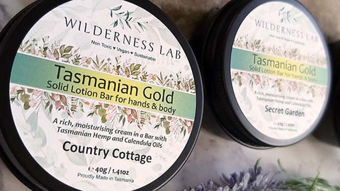 Two tins of Tasmanian Gold Solid Lotion Bar