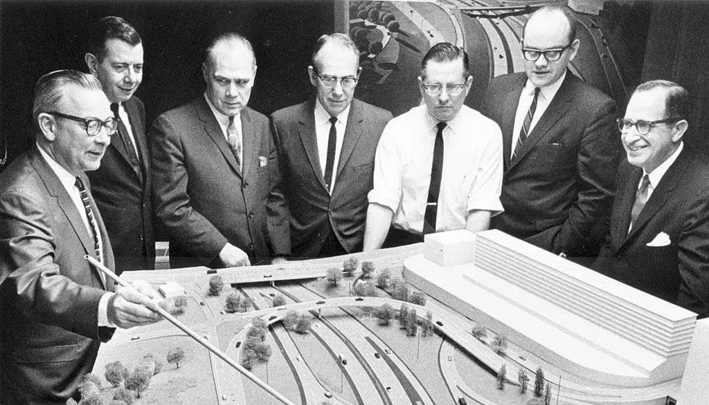 Akron officials look over a scale model of the proposed Innerbelt in the 1960s. Photo credit: AKRON BEACON JOURNAL FILE PHOTO