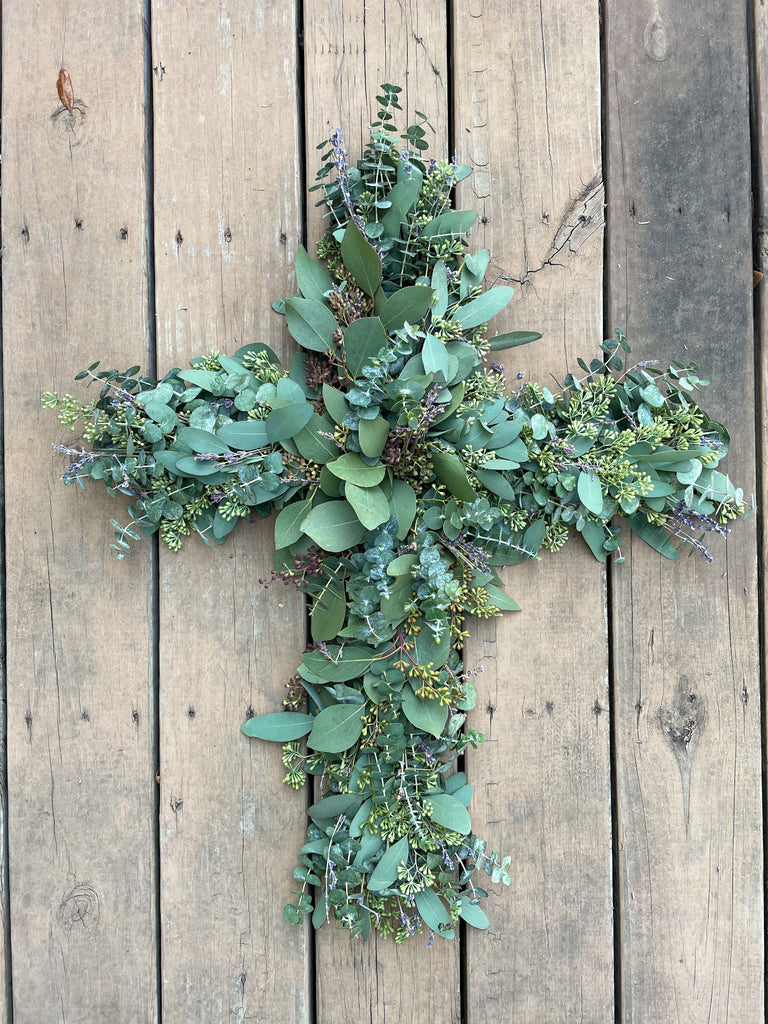 cross wreath made of dried lavender and eucalyptus