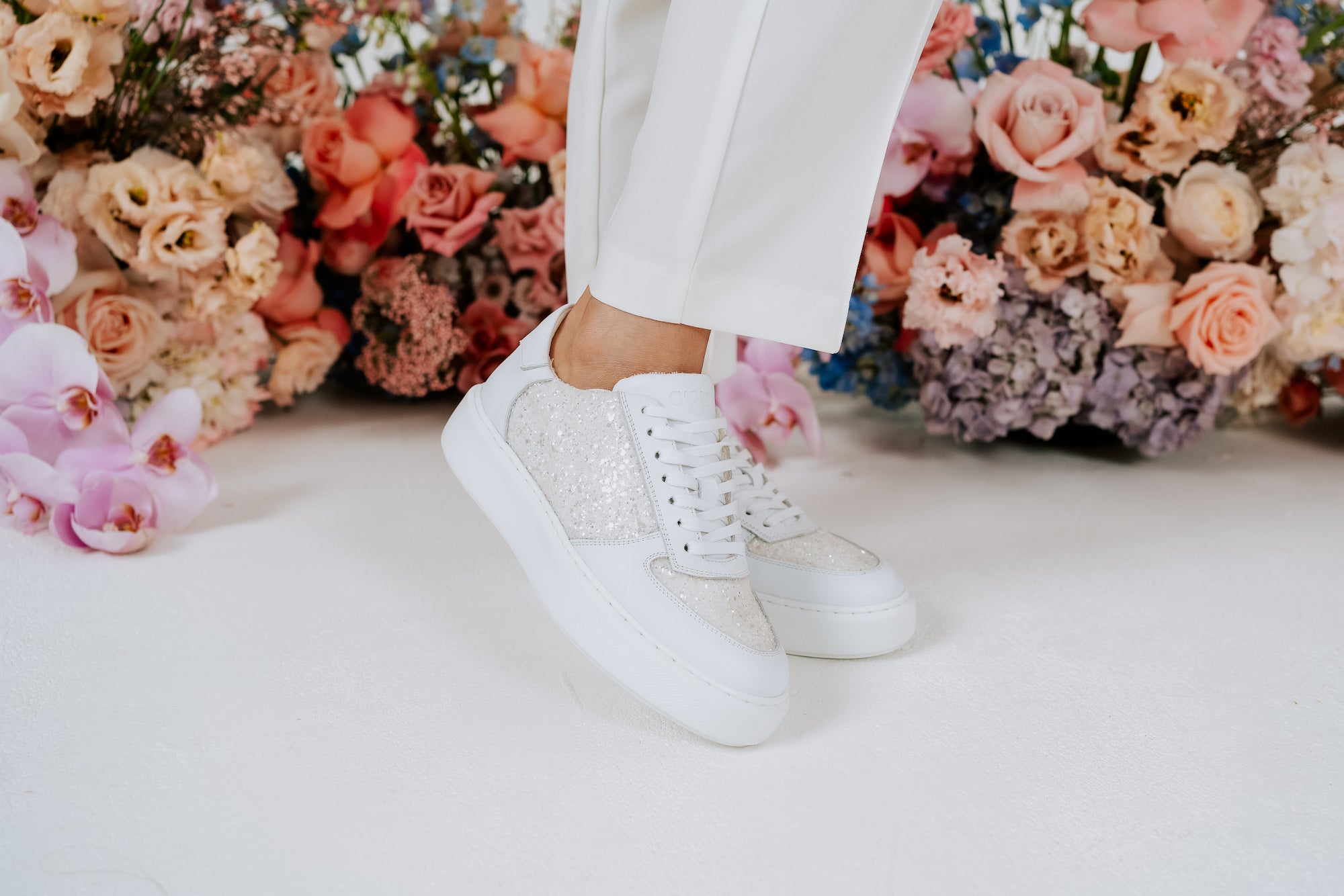 flat bridal shoes by charlotte mills introducing the wedding trainer white with glitter detail