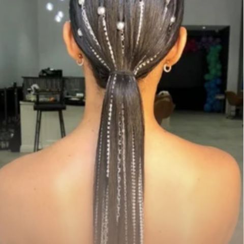 ponytail hairstyle with silver chain