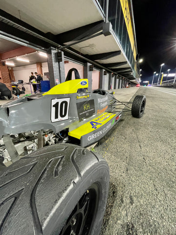 Rear view of a Formula Ford Race Car at night