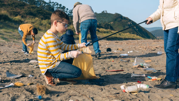 Kid participating in coastal clean up