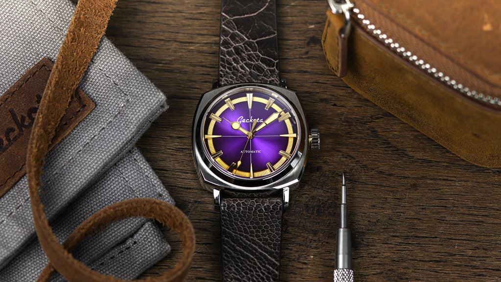 Geckota G-01 purple automatic watch laid on table