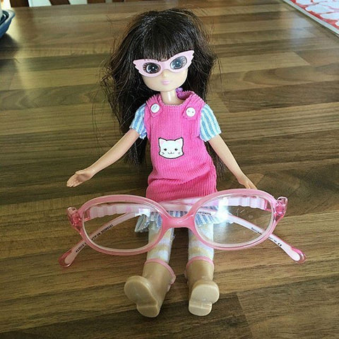 lottie doll with pink glasses
