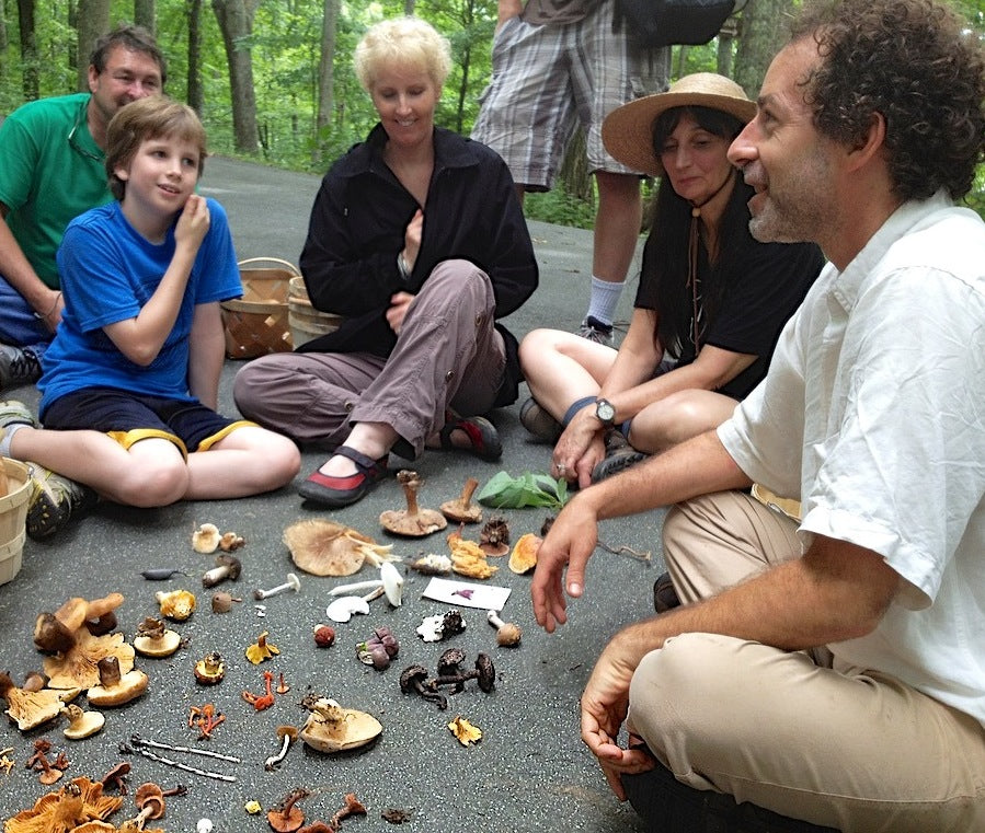 Alan Muskat (right) and foragers with their finds.