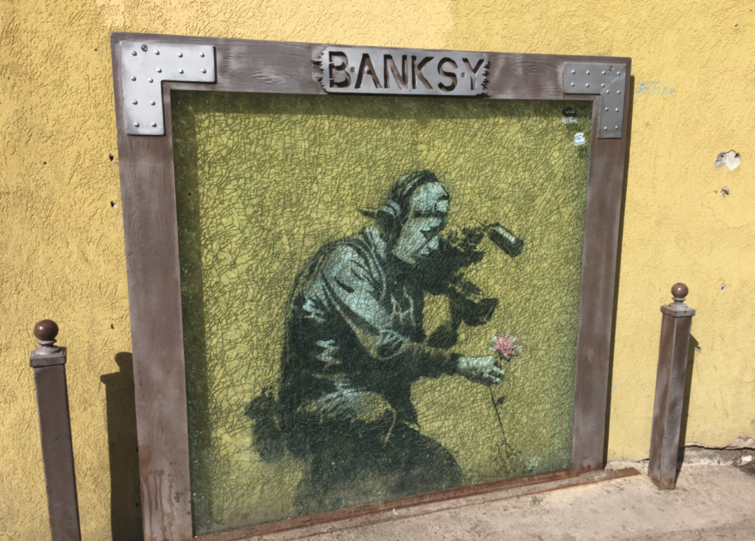 Banksy Louis Vuitton Kid Framed Print