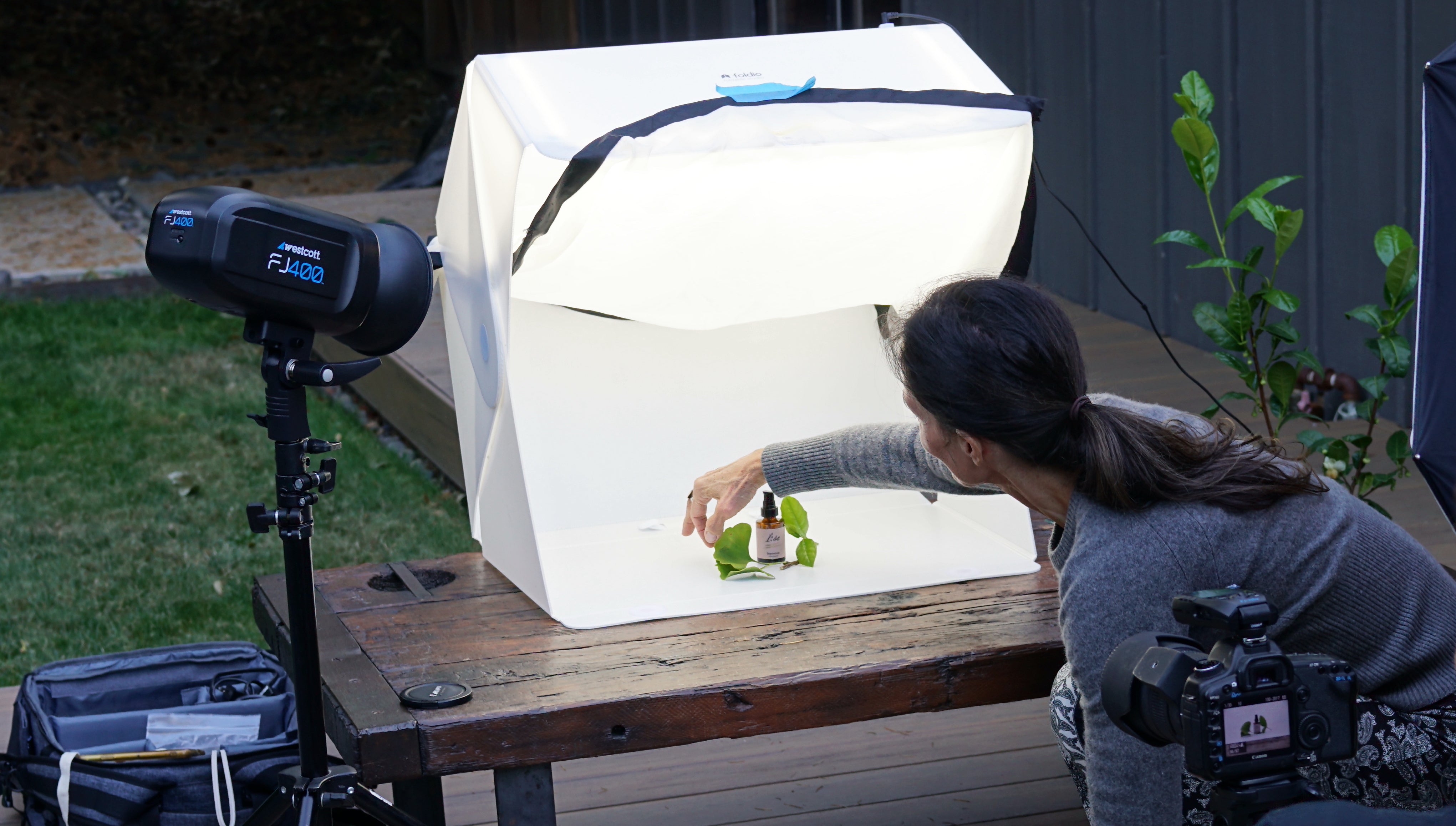 Positioning Face Oil in Lightbox