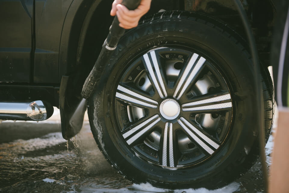 showing how to clean car wheels