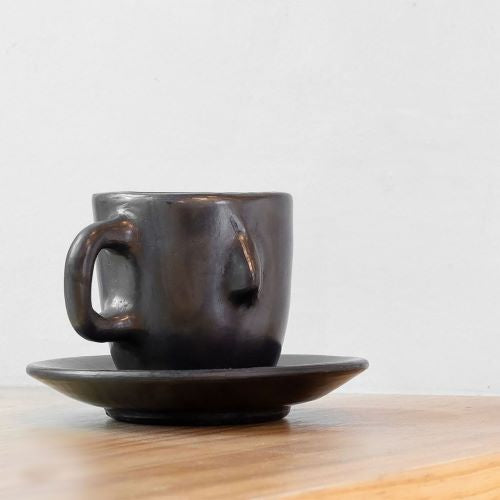 https://cdn.shopify.com/s/files/1/0592/1869/0248/products/the-nopo-mexico-m-a-estudio-set-of-two-black-senorcito-espresso-mugs-01_500x500.jpg?v=1645186432