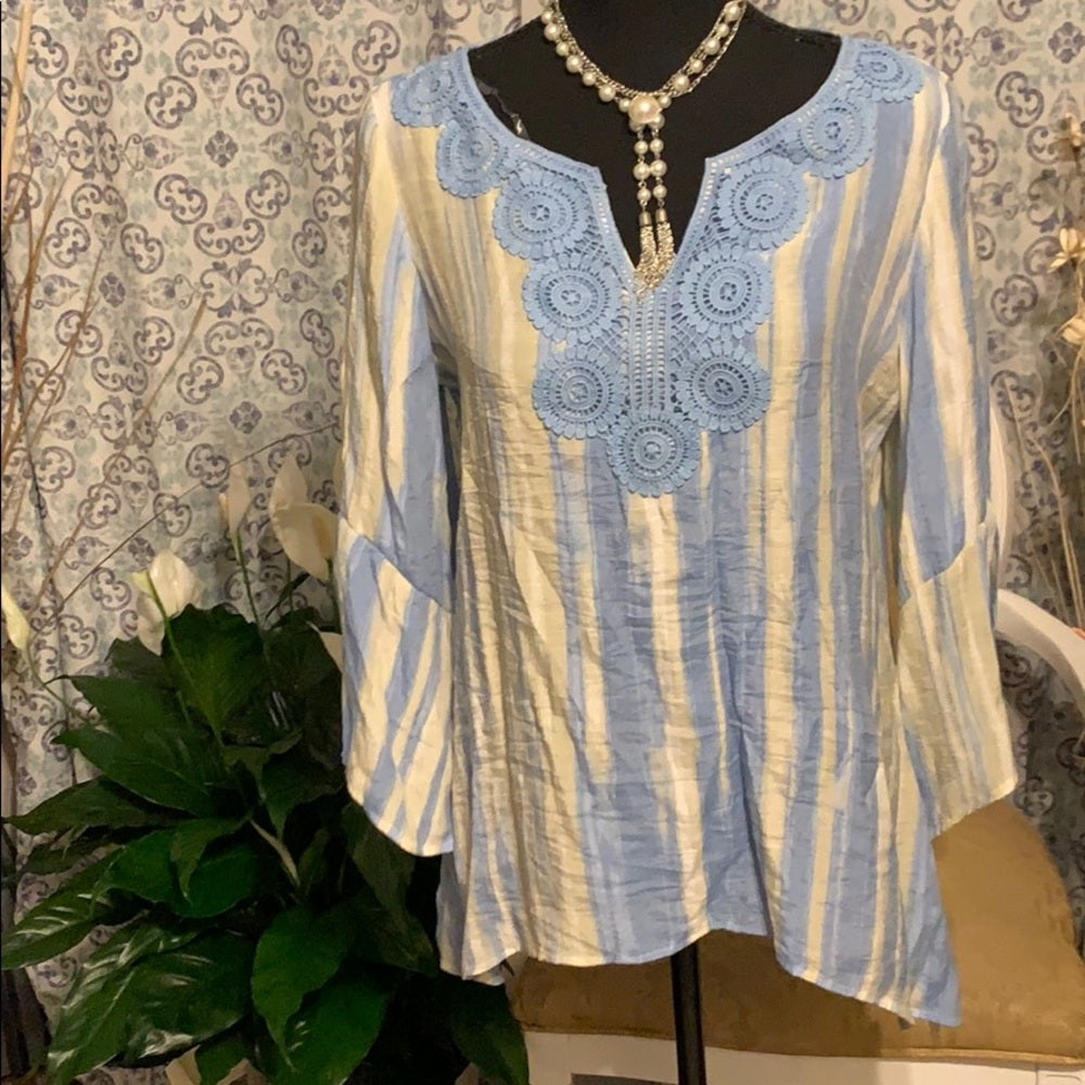 Size small tan and blue blouse.