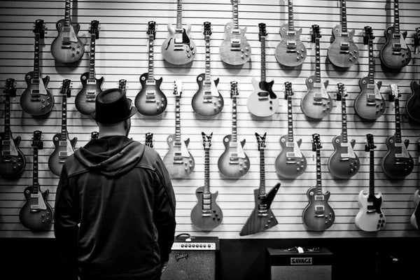 Customer Looking at Les Paul Collection