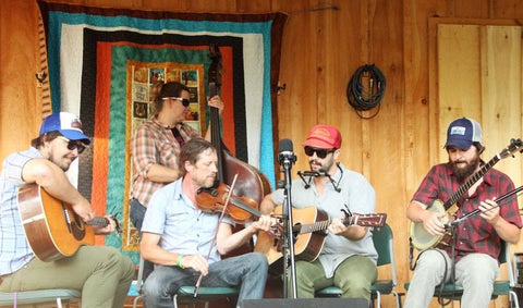 Acoustic Sales Person, JR, with his bluegrass group