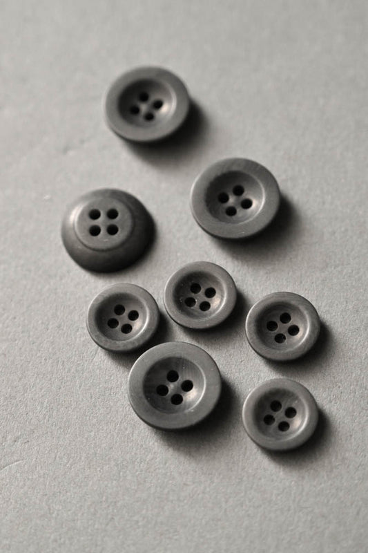 Grey corozo button - 18 mm