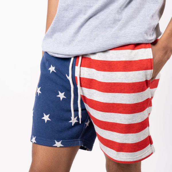 Star and stripe shorts. Half blue with white starts and half red with white stripes. White drawstrings.