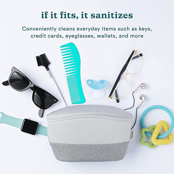 Grey sanitizer bag that fits Apple watch, sunglasses, small comb, eye glasses, pacifier, earphones, and small baby toy. Text reads: If it fits, it sanitizes. Conveniently cleans everyday items such as keys, credit cards, eyeglasses, wallets and more