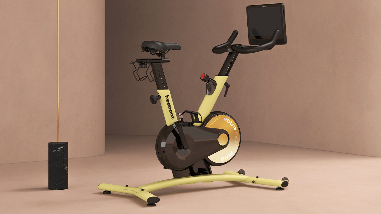 a yellow stationary bike at home