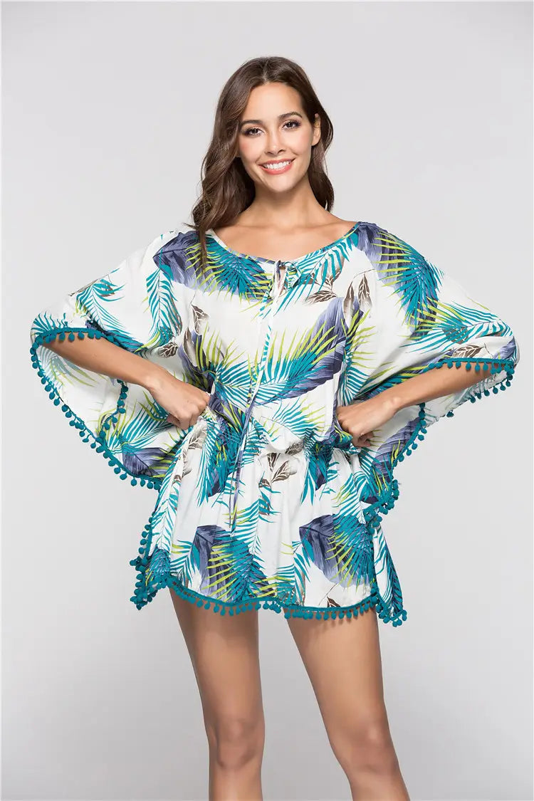 Lovemi - Kurzes bedrucktes Kleid mit Fledermausärmeln und Fransen