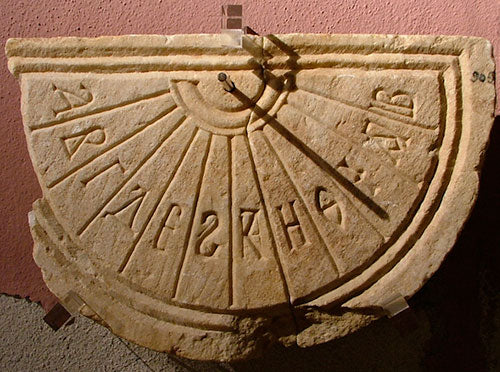 Ancient greek sundial. This is an artifact whose surface would react to the movement of the sun and cast a shadow on the mark pertaining to the actual time of day it happened to be. ZB Watches. Class on time. zbwatches.com