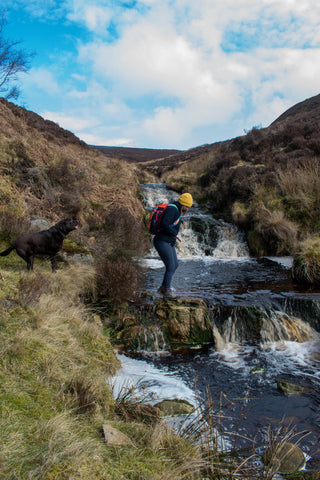 Crossing a waterfall in the Peak District