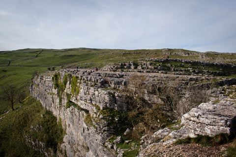 Malham Cove view from the top of the cliffs limestone pavement Yorkshire Dales walks and hikes