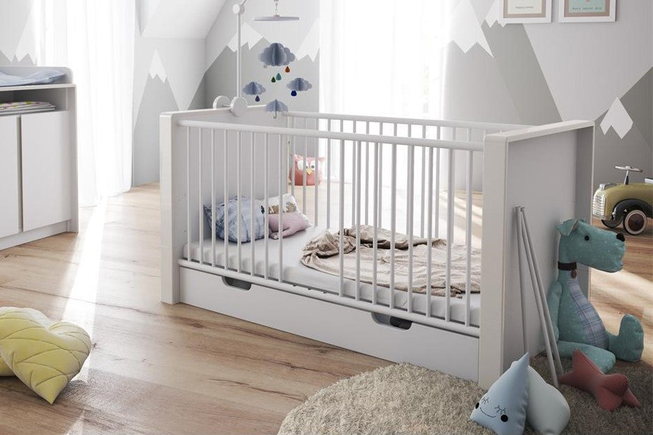 baby crib in bedroom