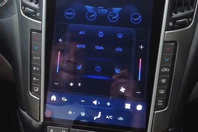 Infiniti Q60 Tesla Carplay Screen displayed climate control