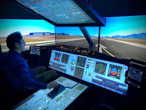 pilot using flight simulator