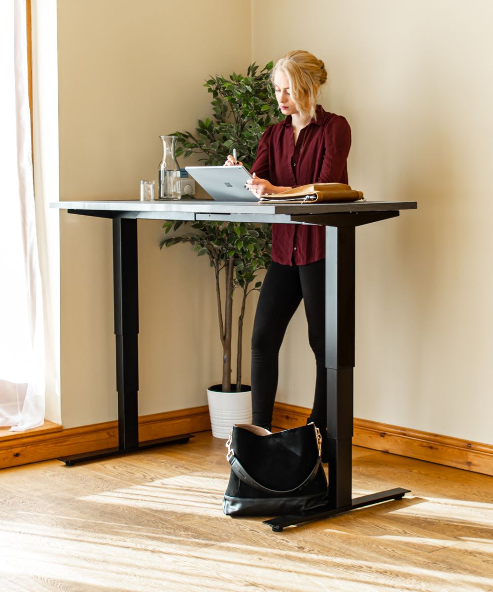 Standing at Masta electrically height adjustable desk