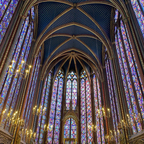 Sainte Chapelle Paris France walls and ceilings of stained glass and chandeliers