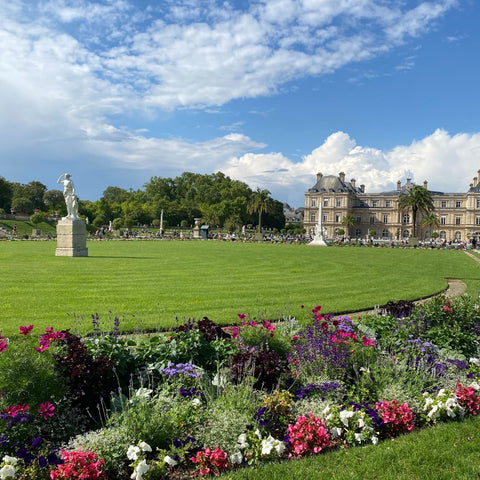 Diana goddess of the hunt statue in the center of lawn at Jardin du Luxembourg Paris France