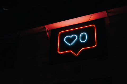 Neon sign of an Instagram like counter on a SMBs' wall