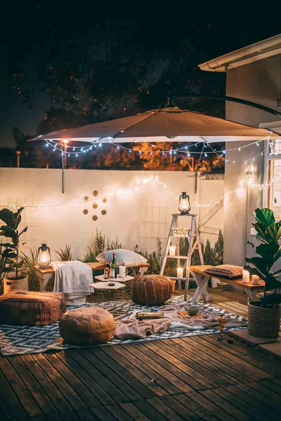 outdoor patio with pillows and floorcloth