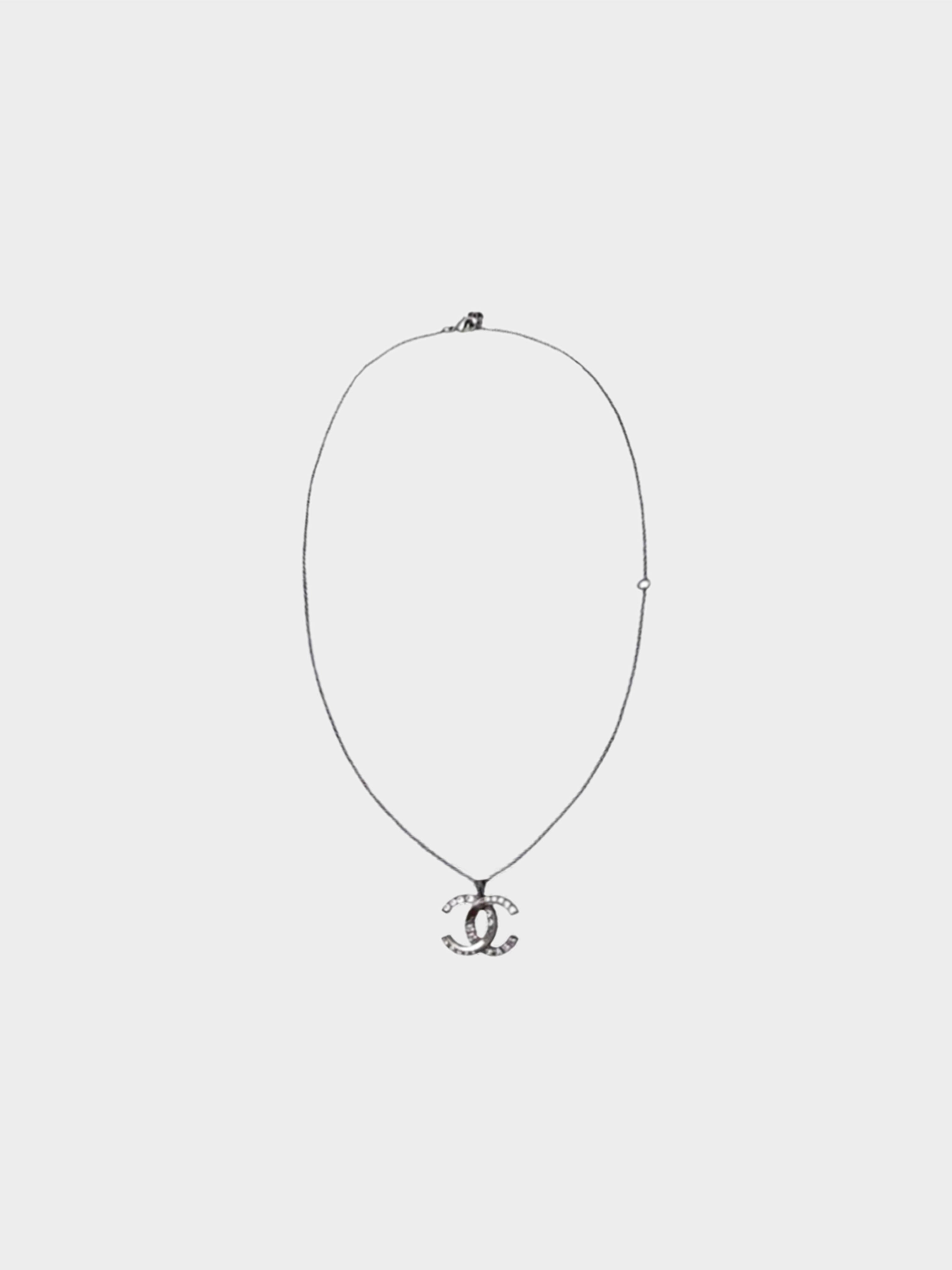 Chanel Fall 2004 Silver Crystal Mini Heart CC Necklace · INTO