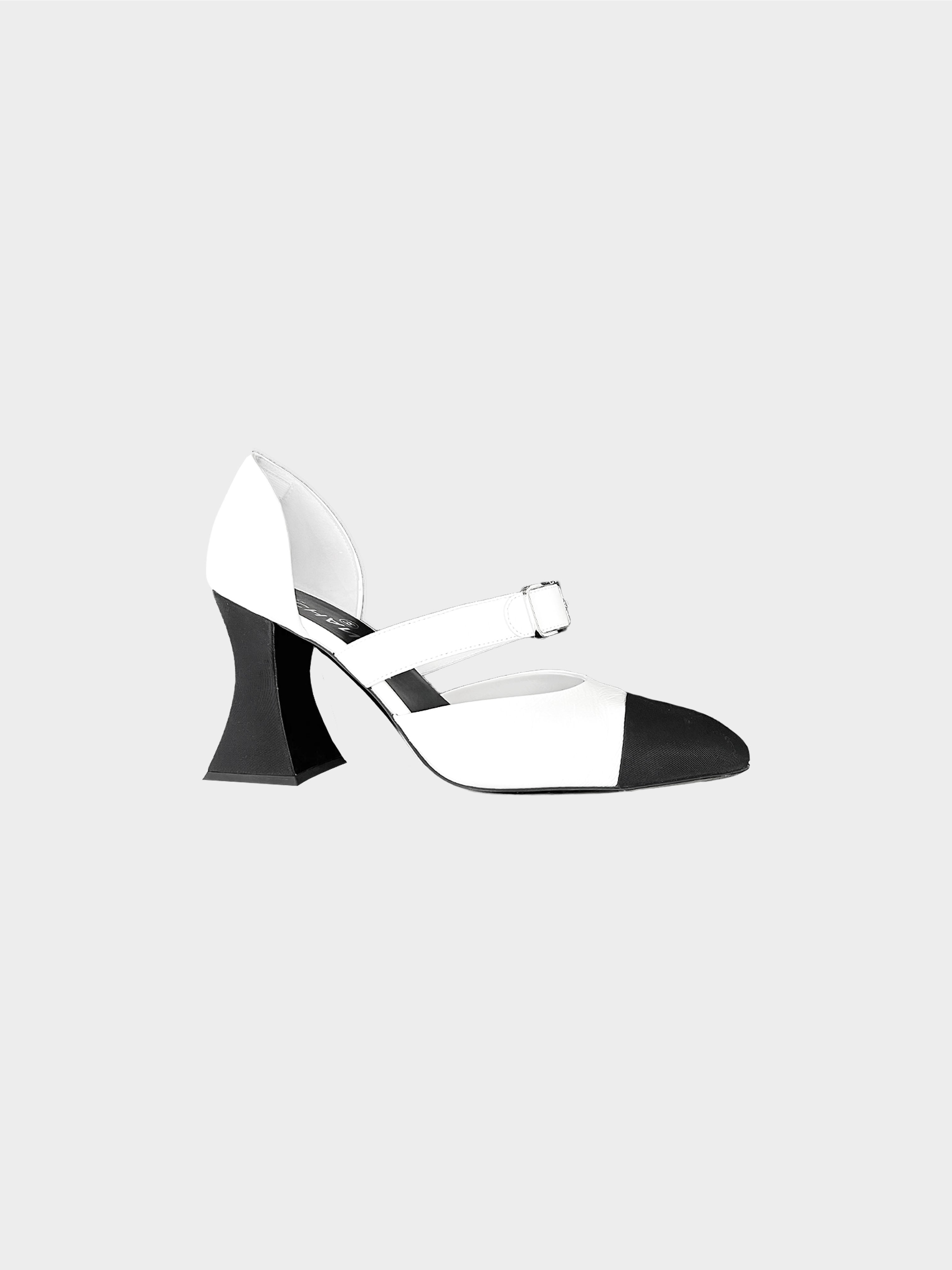 Chanel 2010s Black and White Canvas Leather Pumps